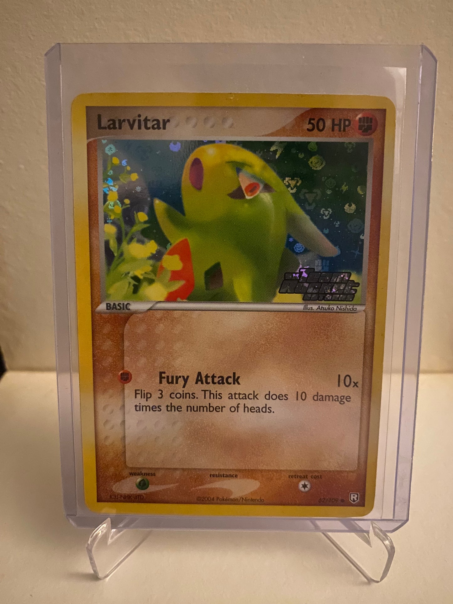 Larvitar Holofoil (62/109)