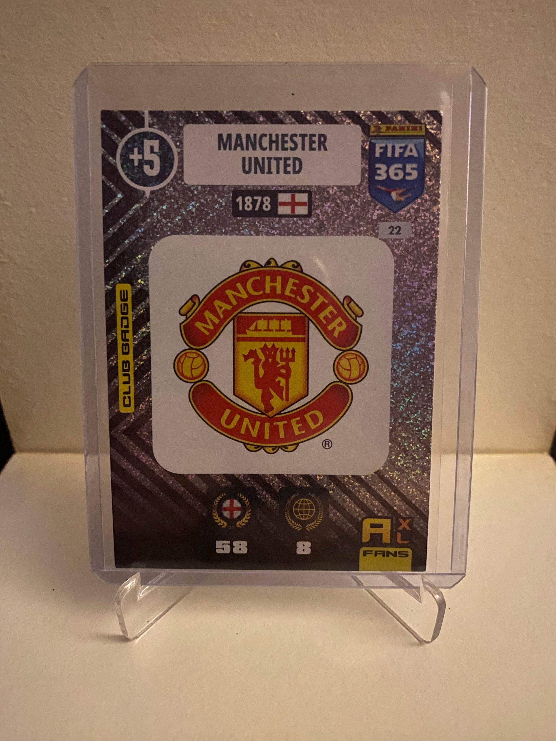 Fodbold kort Panini Adrenalyn XL FIFA 365 2021 - Manchester United Emblem Holofoil - Pokedexet