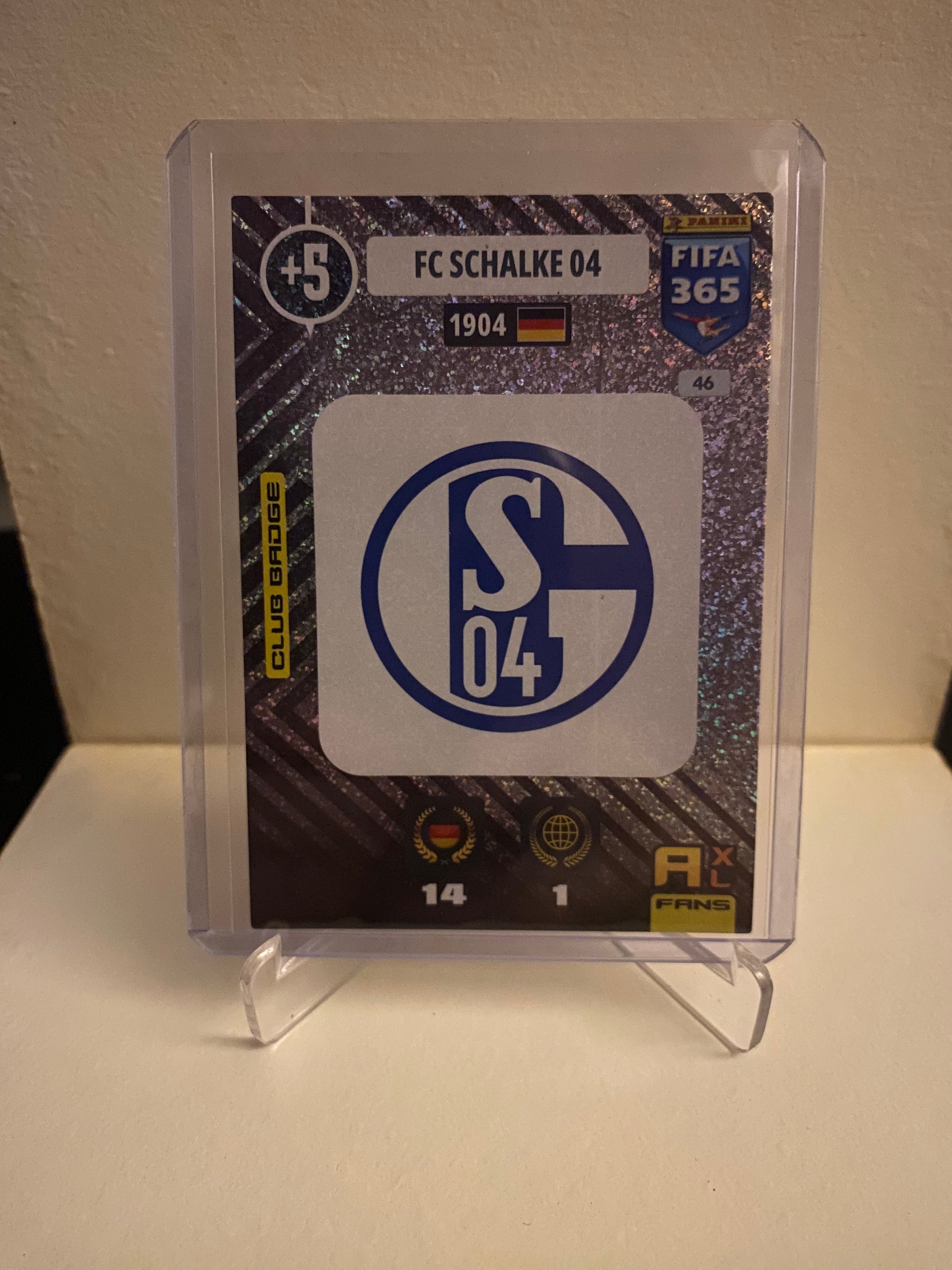 Fodbold kort Panini Adrenalyn XL FIFA 365 2021 - Schalke 04 Emblem Holofoil - Pokedexet