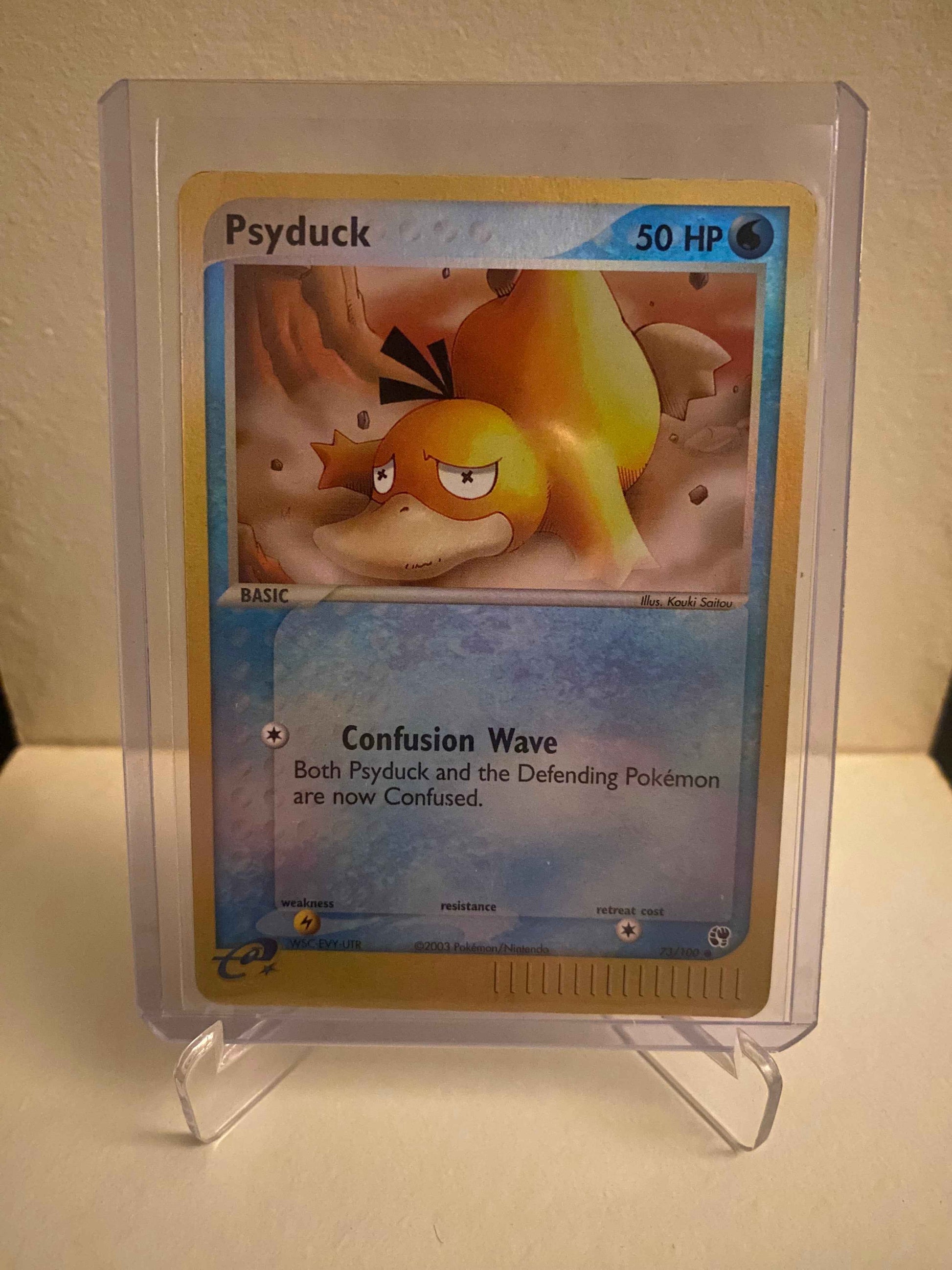 Pokemon kort EX Sandstorm - Psyduck Reverse Holofoil (73/100) - Pokedexet